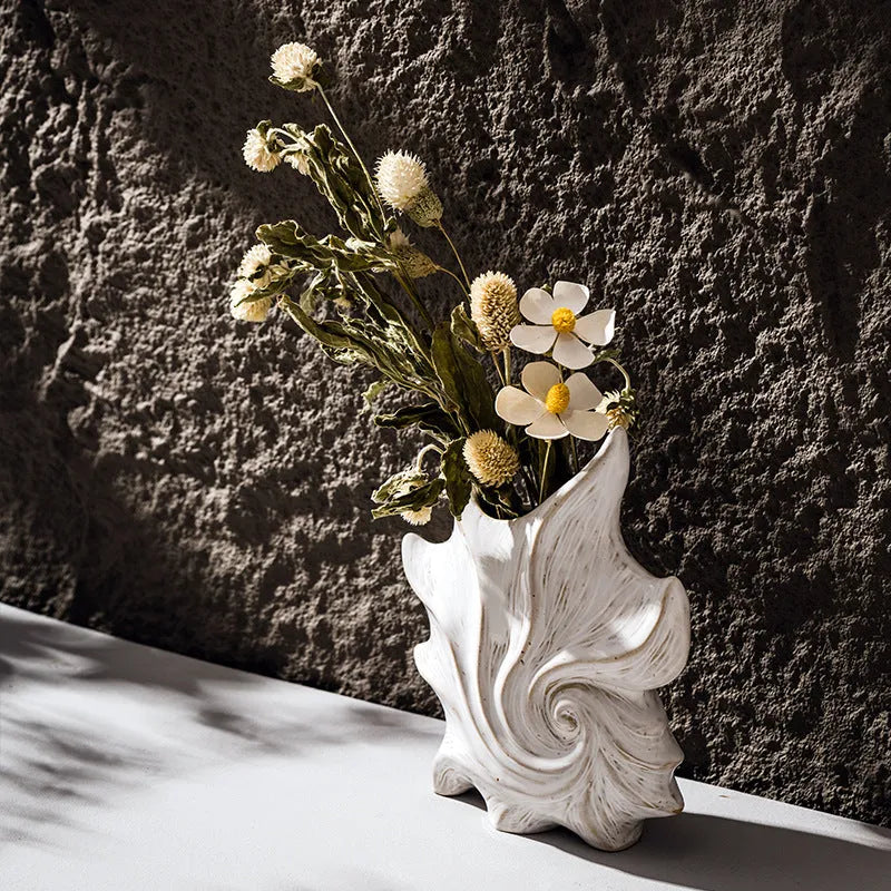 European retro style ceramic vase with a coloured glaze finish on a wooden surface.