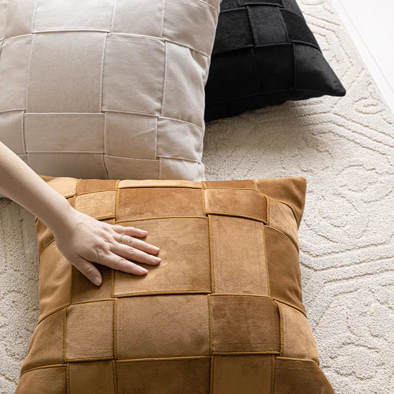 Square chenille woven cushion in a choice of seven colours on a sofa, showing its 50x50cm size and textured fabric.