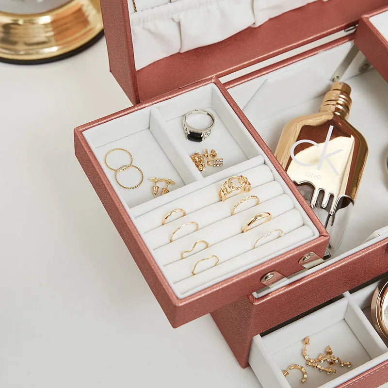 Hard-sided rectangular jewellery storage box in beige PU leather with lid closed