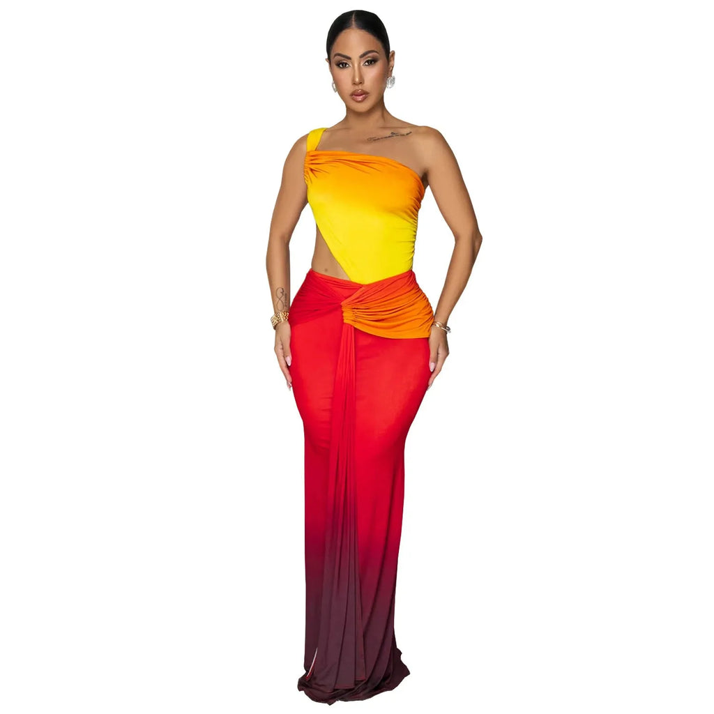 A woman's gradient colour cross-shoulder sleeveless dress with a high waist and long skirt.