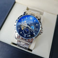 Men's silver case automatic watch with black dial, luminous hands and transparent mechanical case back