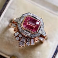 Rose gold colour women's fashion ring with geometric shape and ruby design elements in retro style