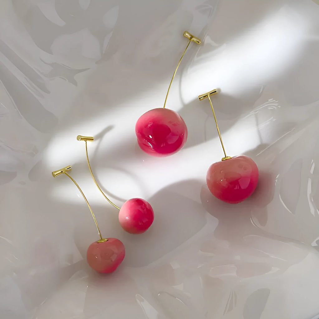 Small and large peach fruit earrings made from acrylic with copper earring findings
