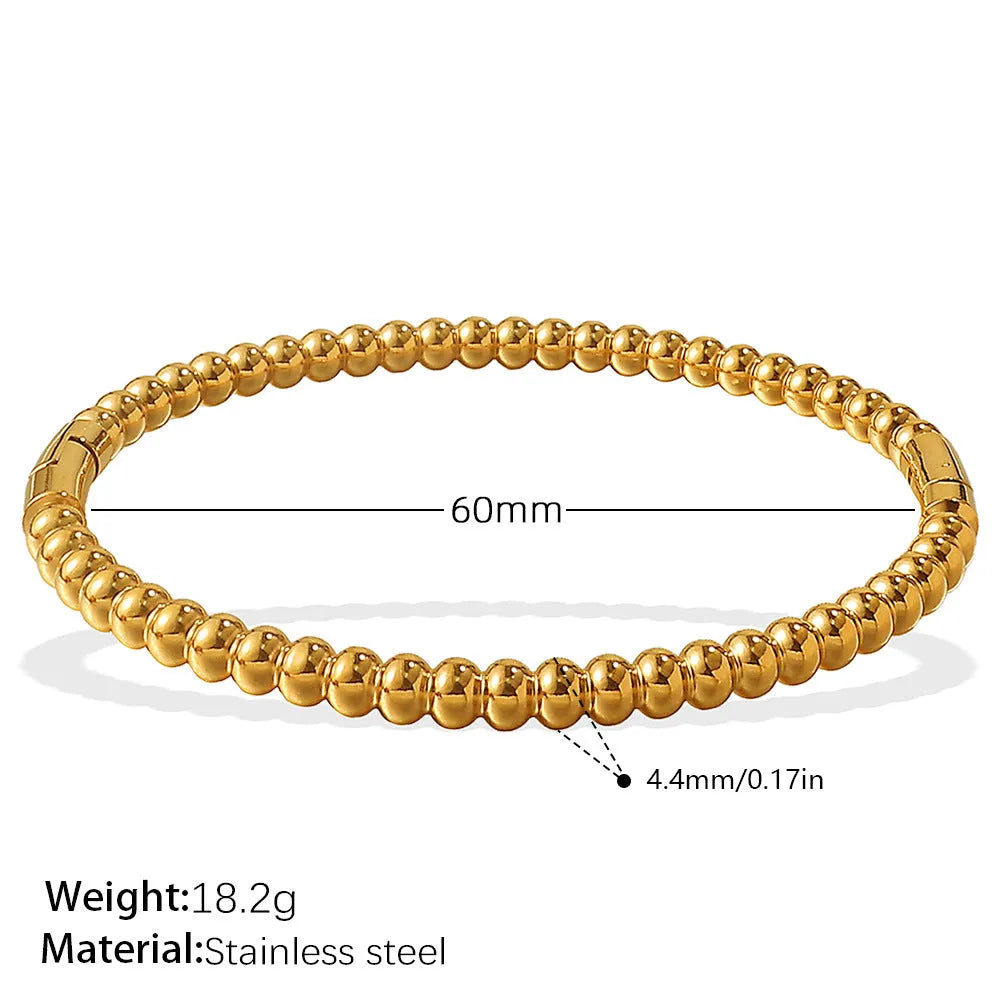 Stainless steel open-end buckle bracelet with electroplated finish, available in gold, white zirconium, and white diamond colours