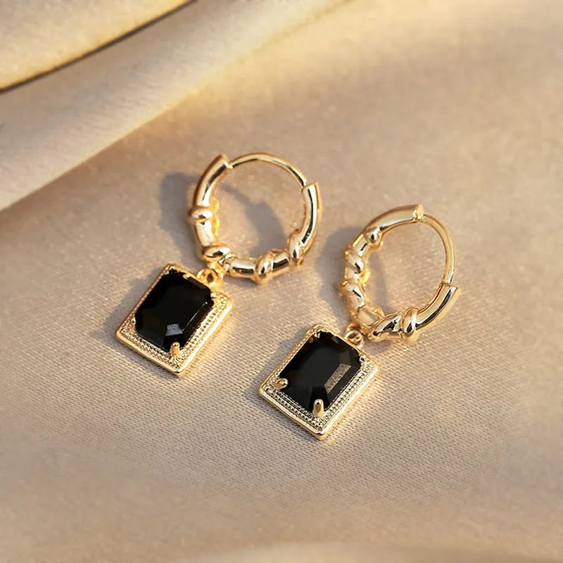 Black geometric copper earrings with zircon stones in French court drop design