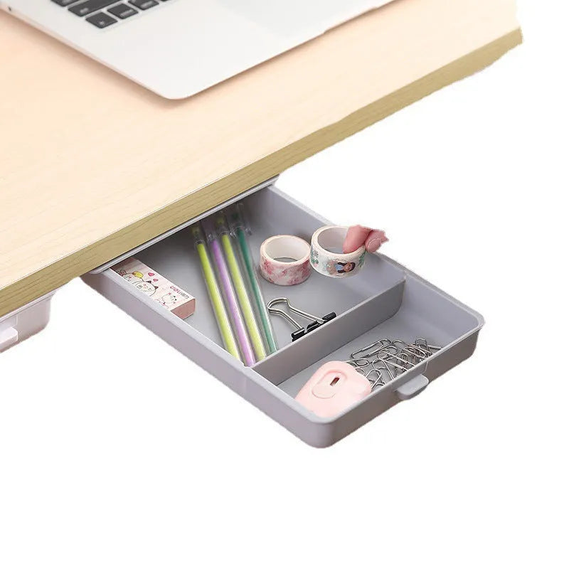 White plastic adhesive storage drawer with cover and internal grid compartments for under-desk organisation