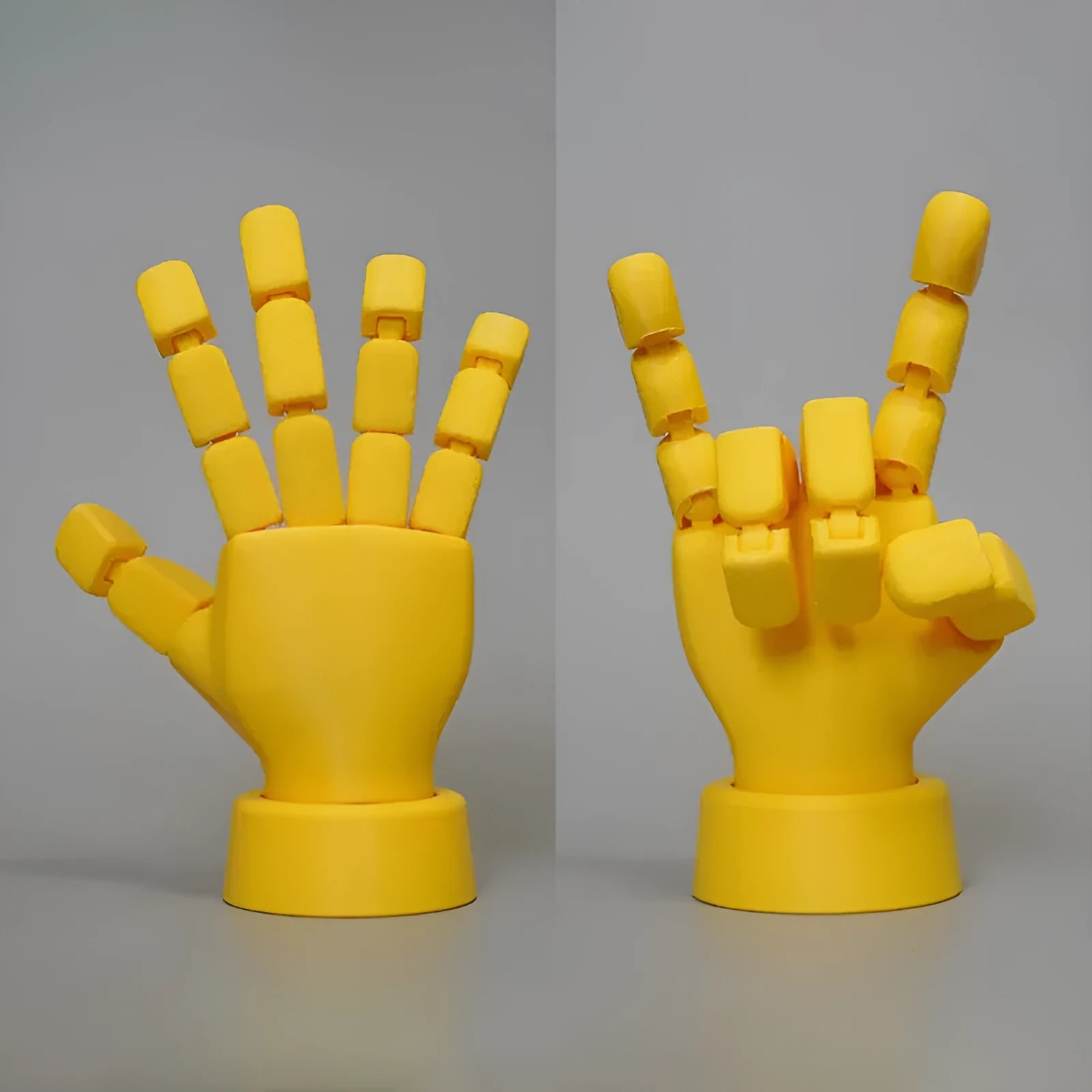 Yellow movable joint hand ornament figurine on a plain background.