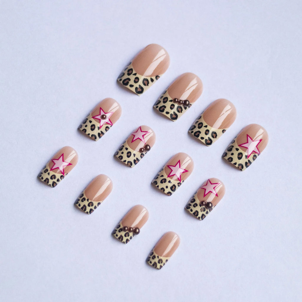 Wear Armor French leopard print five-pointed star press-on nails with pearl and diamond accents