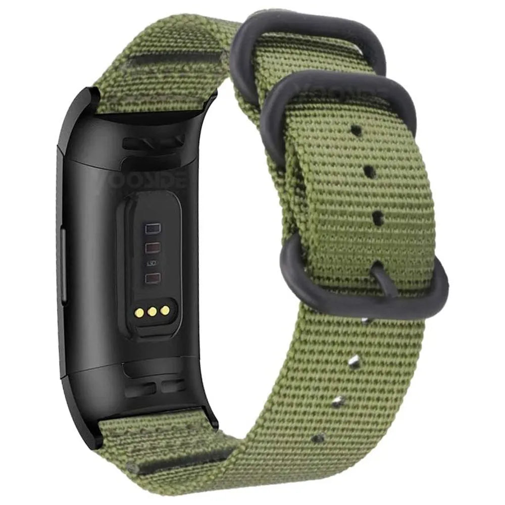 Fitbit Charge nylon replacement strap with a three-ring metal buckle shown in multiple colour options.