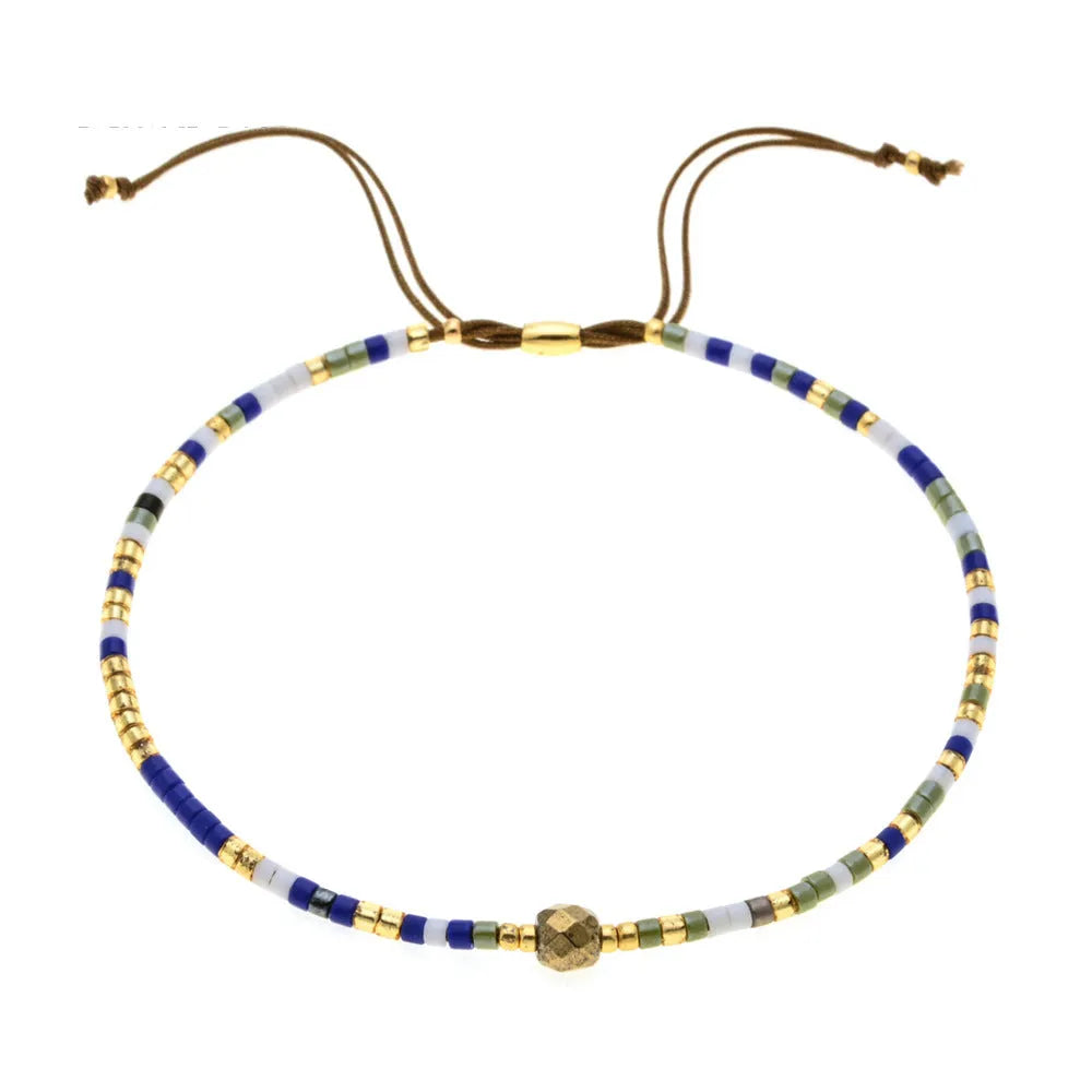 Bohemian style women's bracelet with semi-precious stone and colourful glass beads on adjustable fastening
