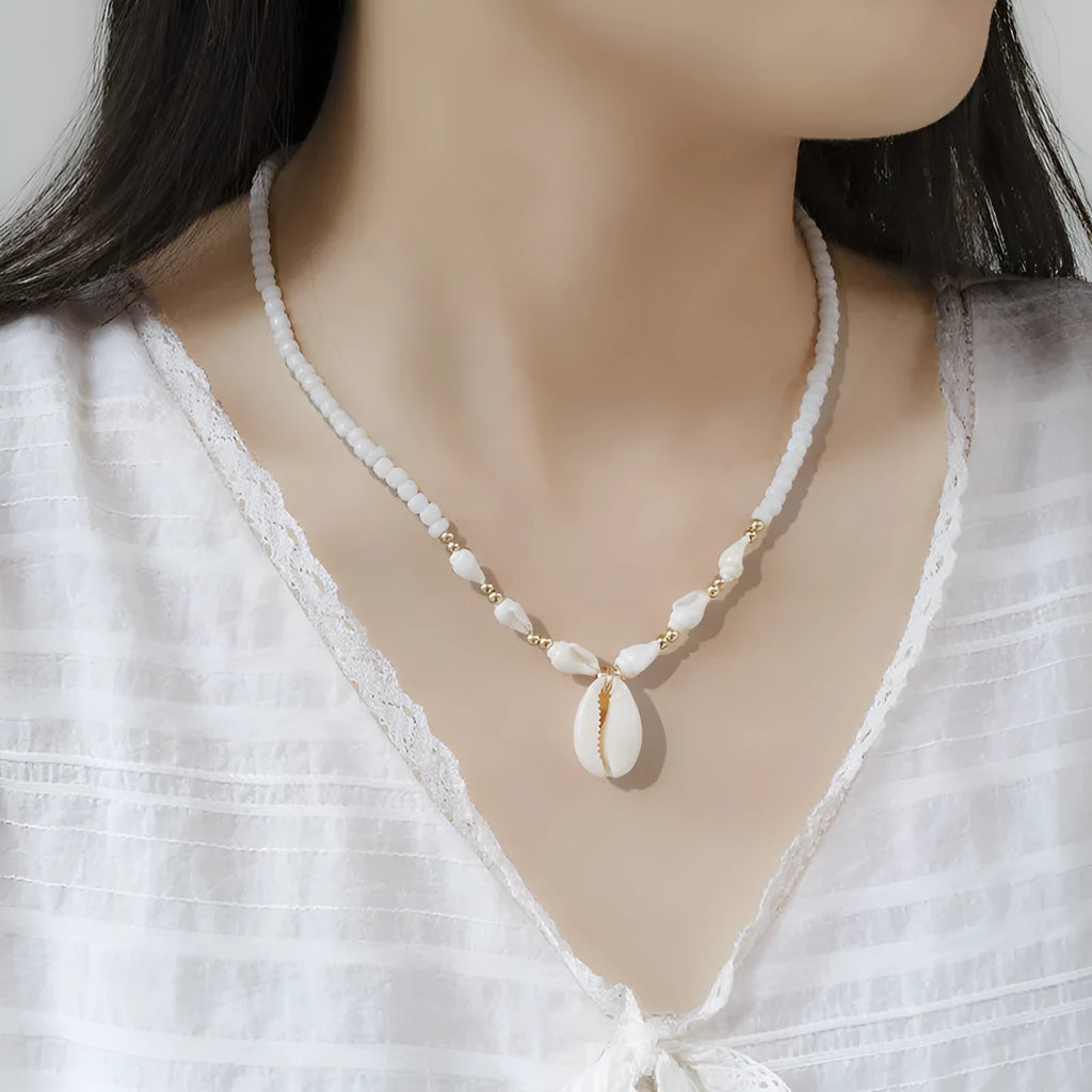 White shell necklace with mother of pearl pendant on regular chain