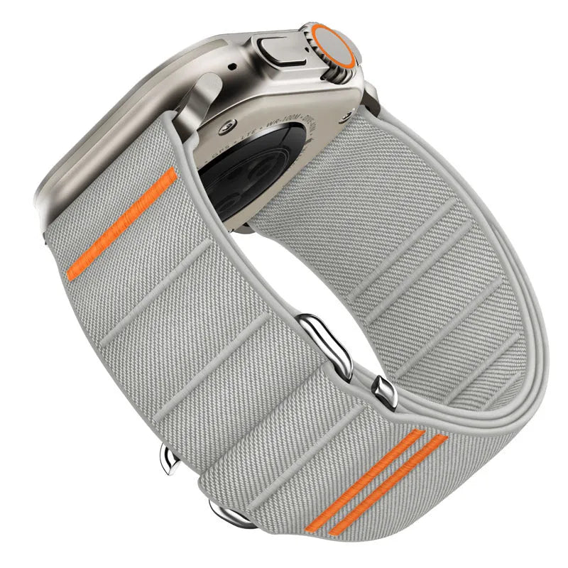 Elastic nylon sport loop strap with stainless steel buckle for Apple Watch, shown in multiple colour options.