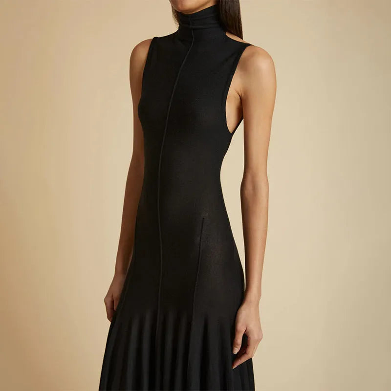 Grey slim-fit cotton dress with a half turtleneck neckline and a backless design.