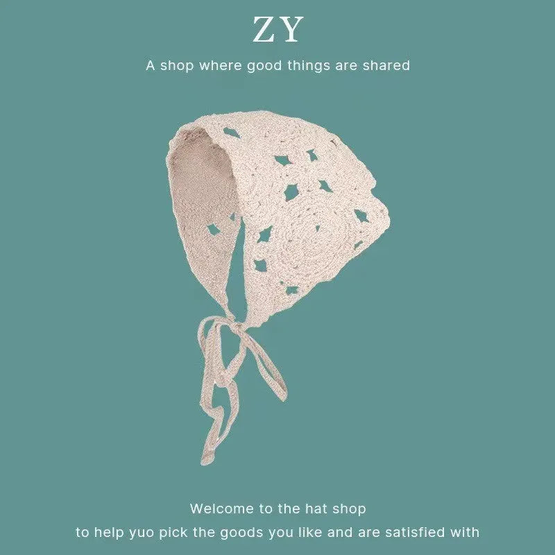 Women's cotton triangular headscarf with floral pattern in a retro French style.
