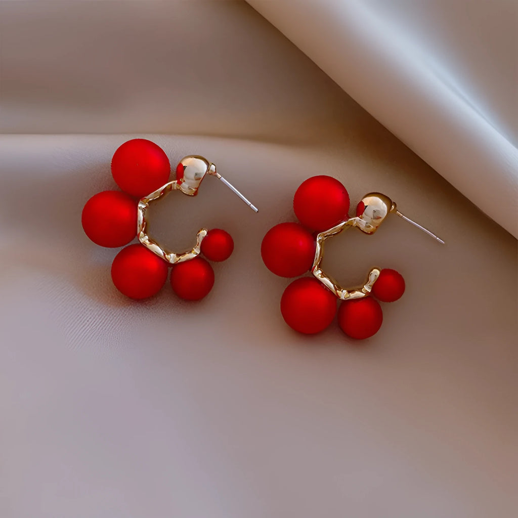 Red bell-shaped alloy ear rings for women with hook fitting, also available in white