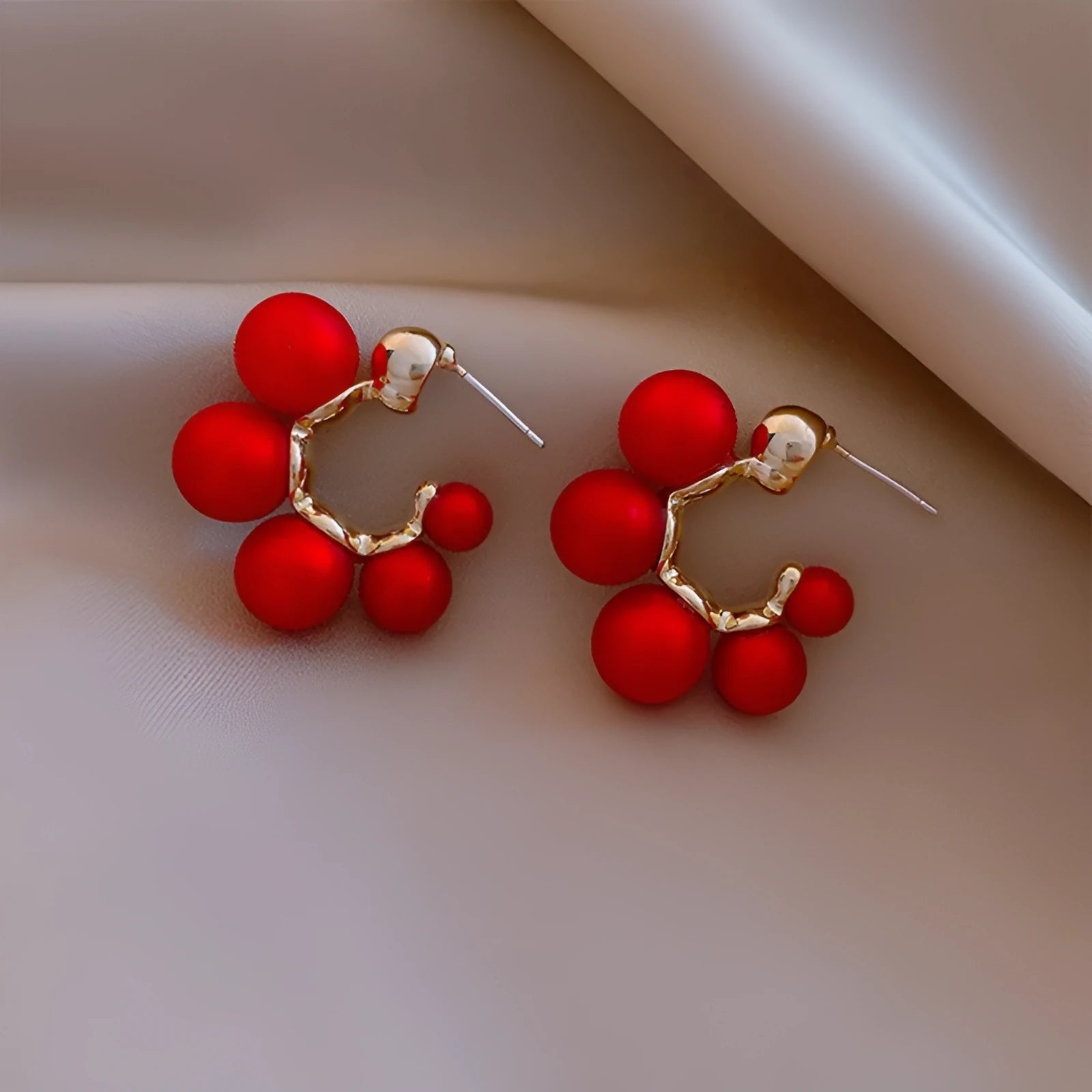 Red bell-shaped alloy ear rings for women with hook fitting, also available in white