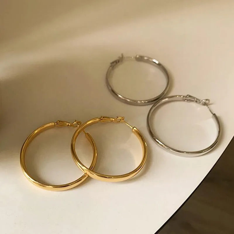 40mm circular metal earrings in gold or silver electroplated finish
