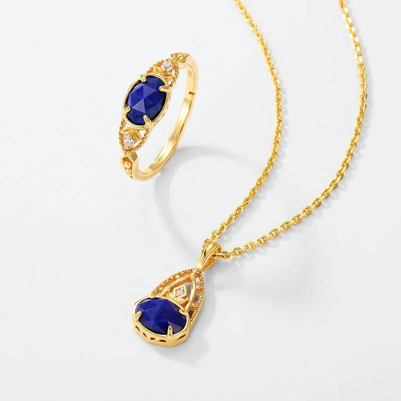 Geometric oval silver alloy ring with lapis lazuli stone centrepiece