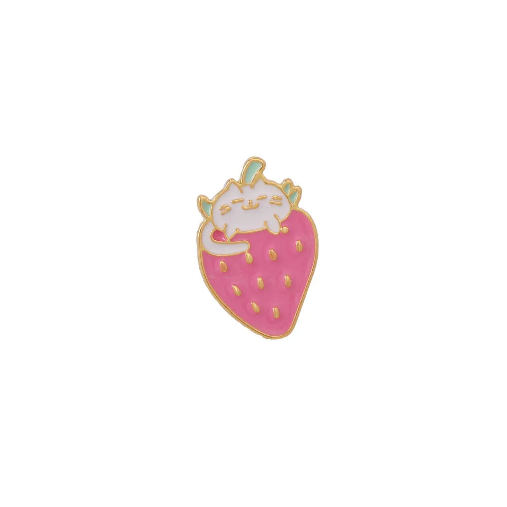 Cat strawberry metal brooch with alloy finish in five colour options on a bag