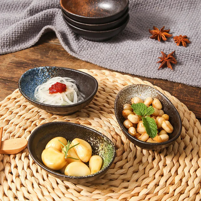 Japanese ceramic oval sauce dipping bowl with underglaze finish in Edo pattern design