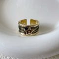 Women's geometric drop oil ring with adjustable sizing in retro distressed style