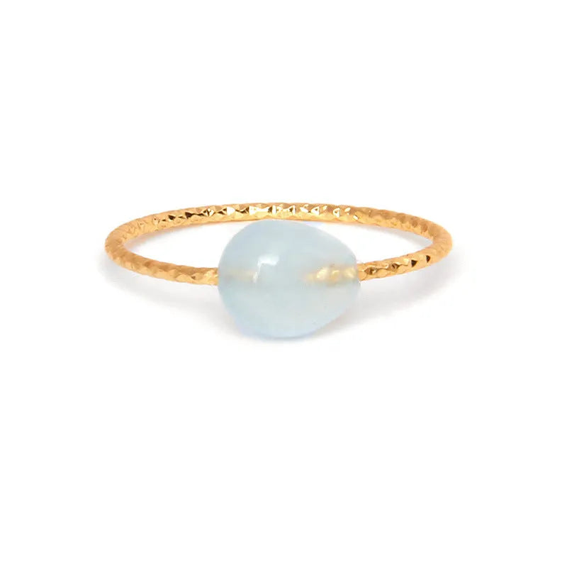 Geometric agate ring for women showing structured design with coloured natural stone centrepiece