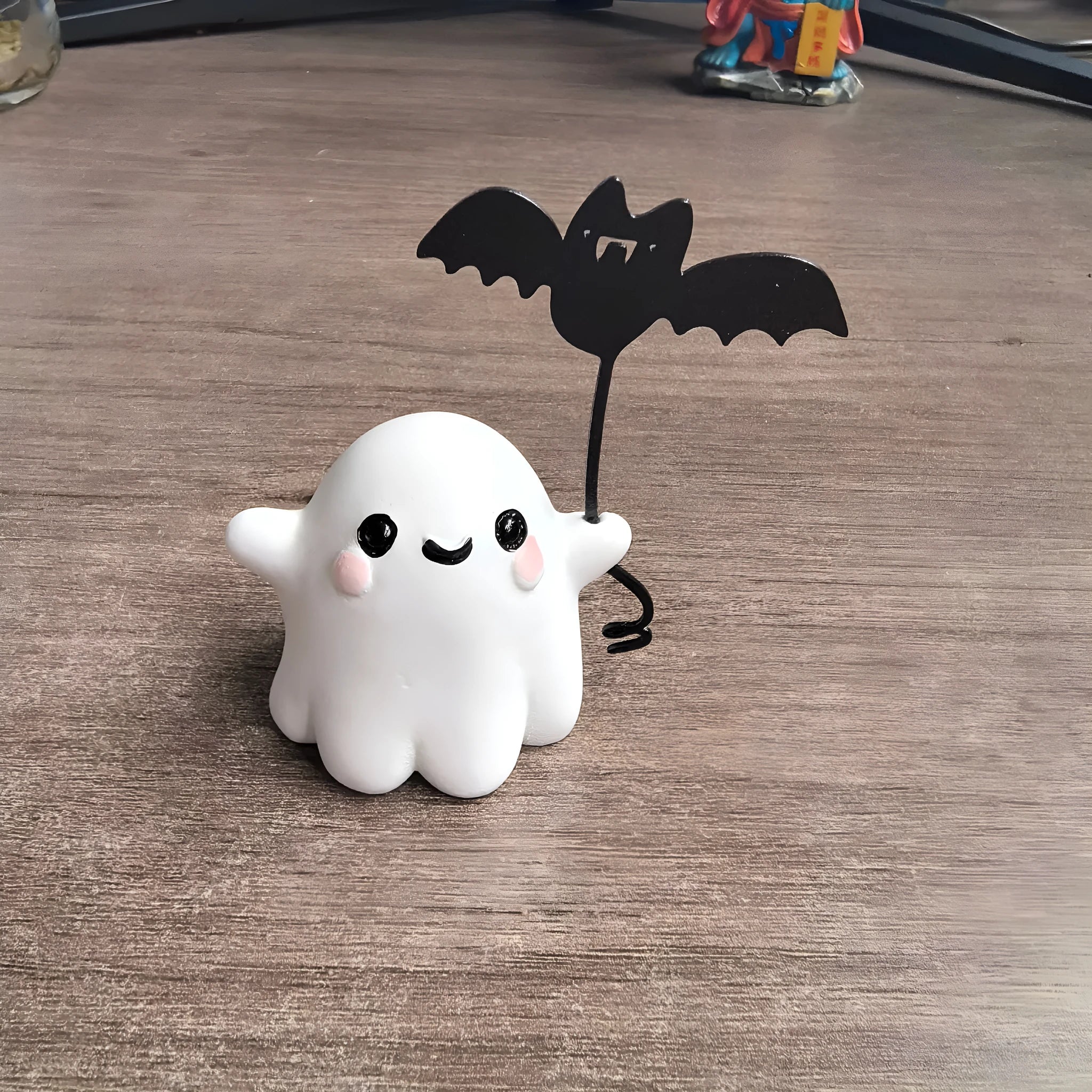 Mini ghost walking dog Halloween statue with ghost holding bat design on resin base