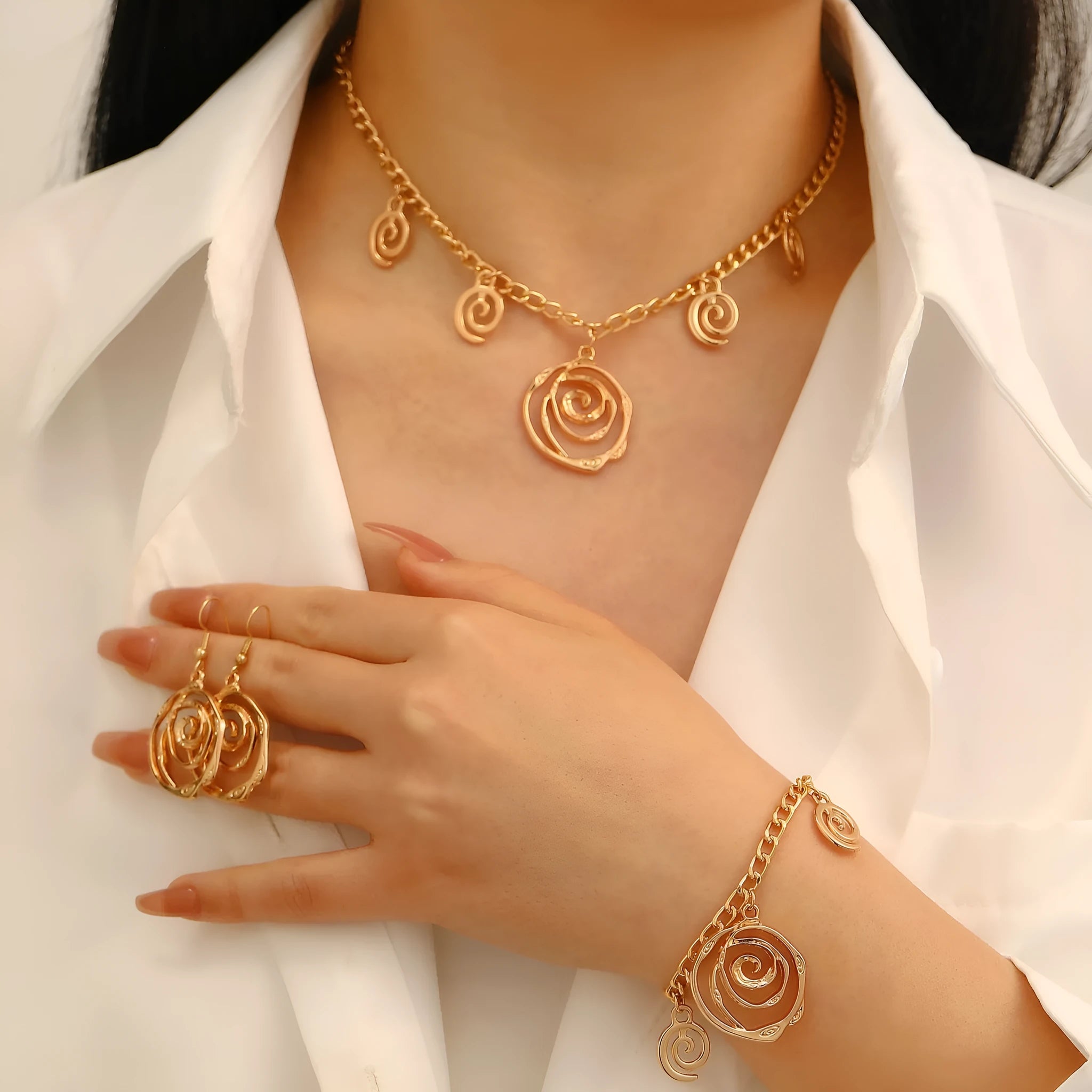 Spiral donut geometric jewellery set with necklace bracelet earrings in gold finish