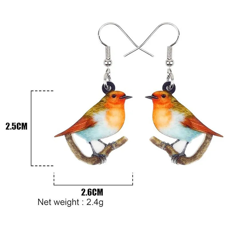 Acrylic blue titmouse pendant earrings with geometric animal zodiac designs and snake pattern details