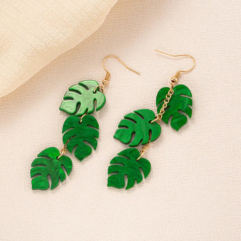 Acrylic drop earrings with coconut design on alloy hooks, shown in five colour variations.