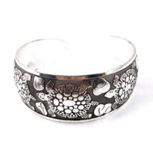 Carved open Miao silver alloy bracelet in Elephant and Turtle colour options with Roman shape