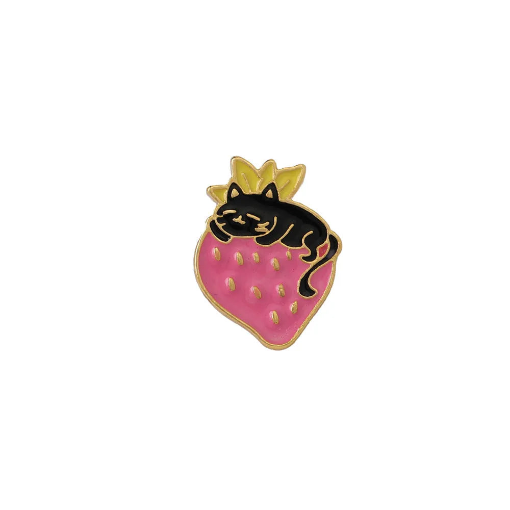 Cat strawberry metal brooch with alloy finish in five colour options on a bag