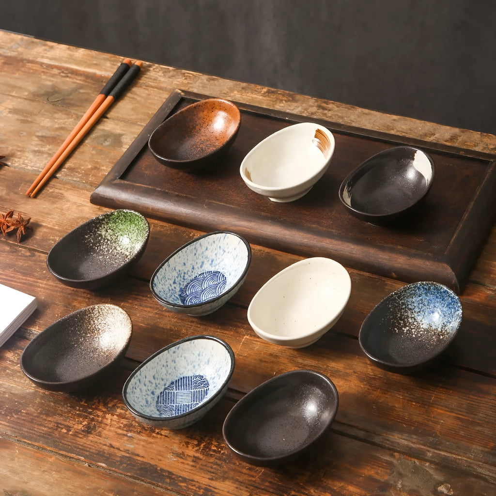 Japanese ceramic oval sauce dipping bowl with underglaze finish in Edo pattern design