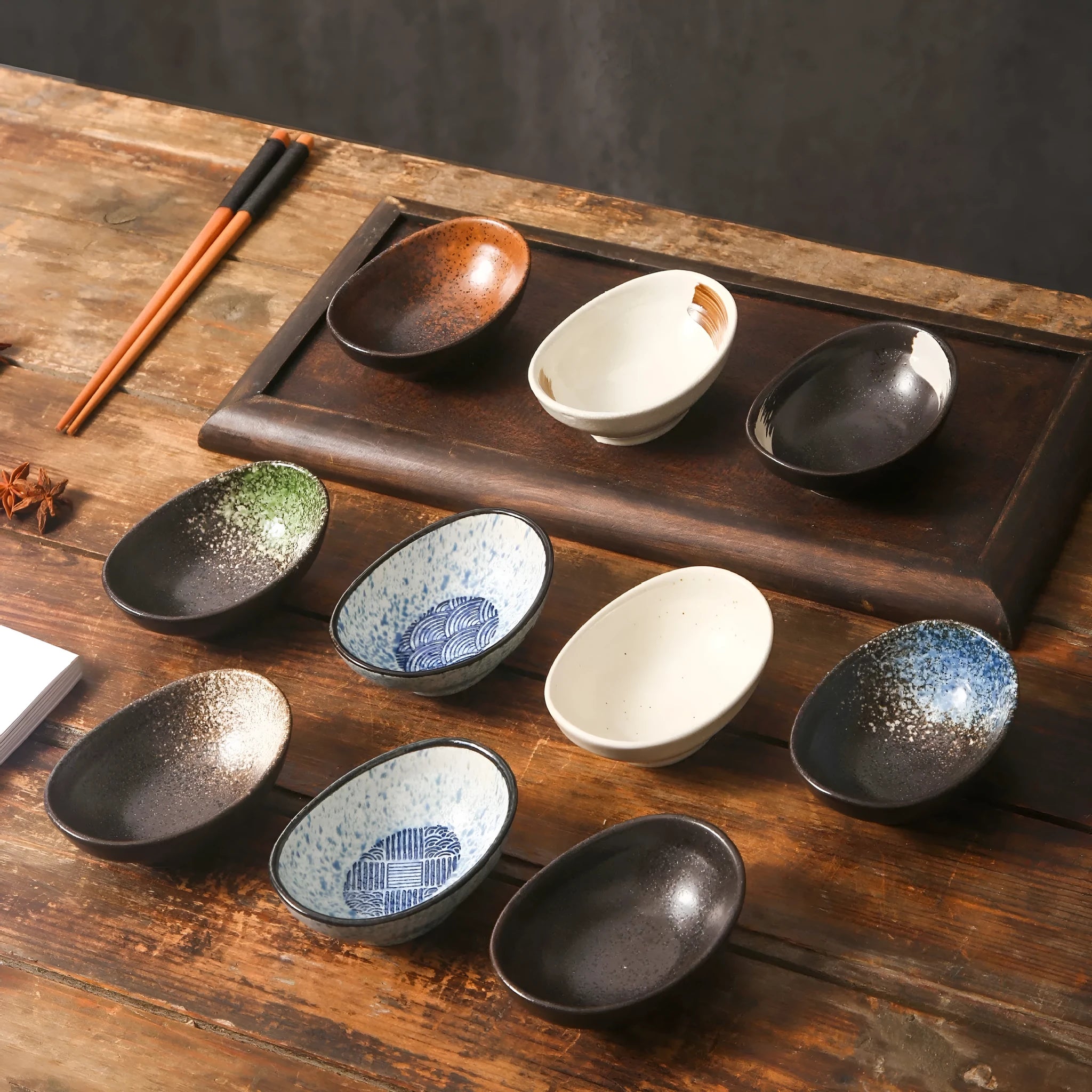 Japanese ceramic oval sauce dipping bowl with underglaze finish in Edo pattern design