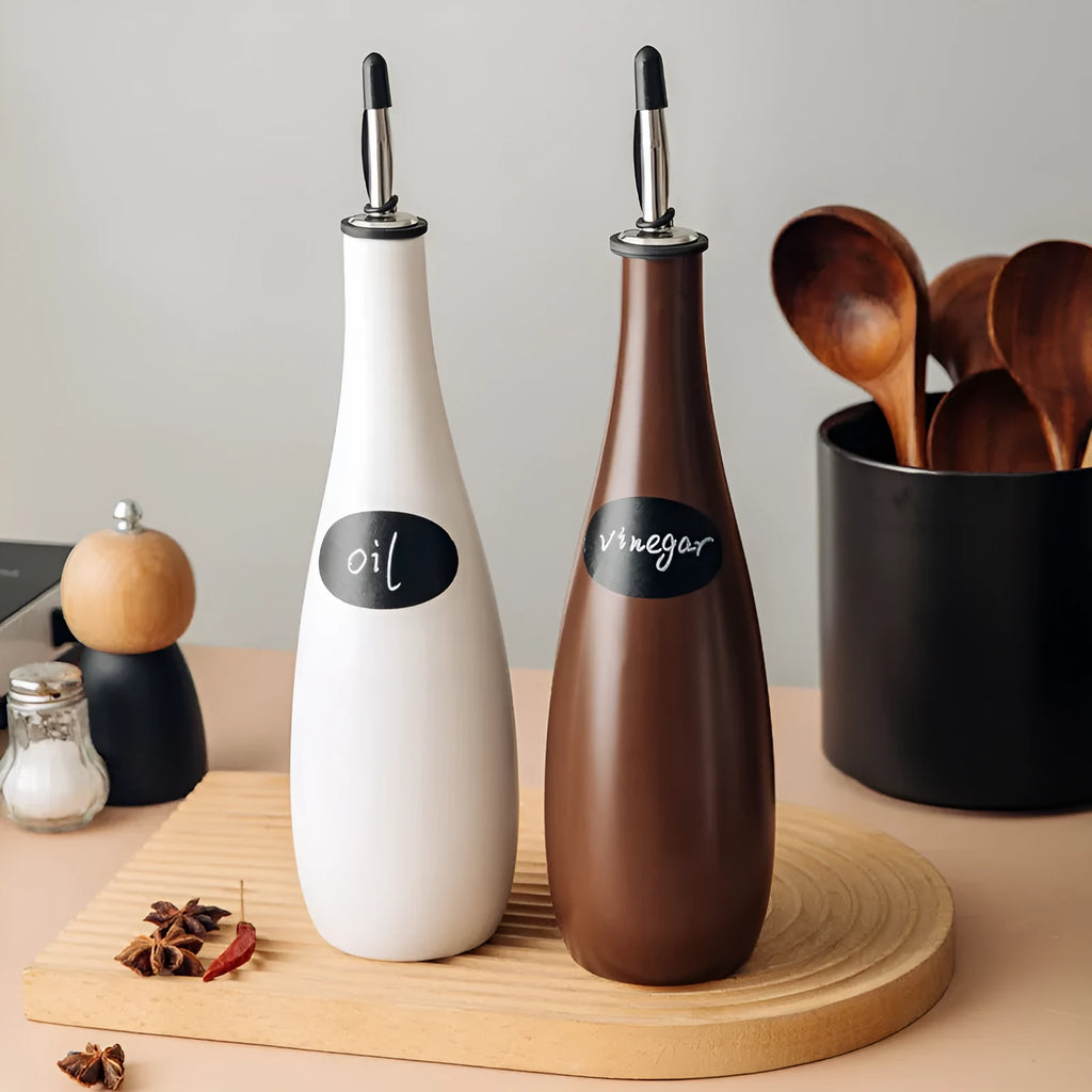 Ceramic oil pot with integrated oil brush and conical funnel design in black, coffee, or white colour