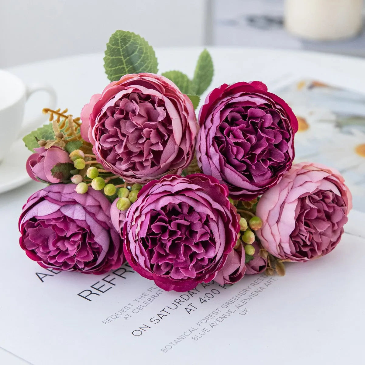 Artificial silk peony bouquet in champagne colour for home or wedding decoration.