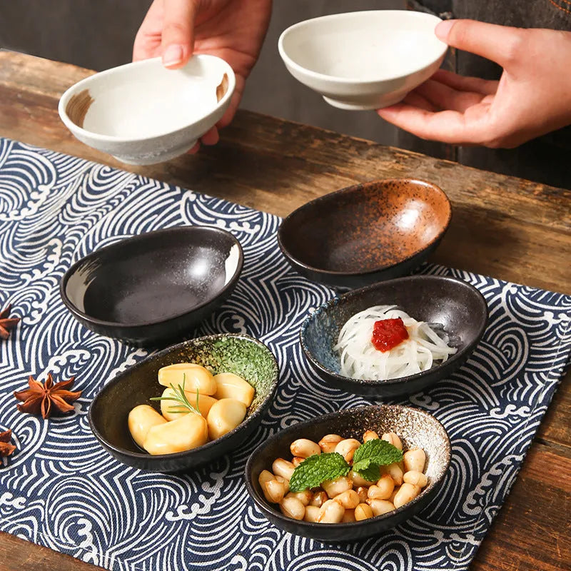 Japanese ceramic oval sauce dipping bowl with underglaze finish in Edo pattern design