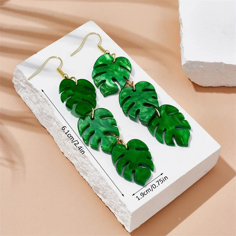 Acrylic drop earrings with coconut design on alloy hooks, shown in five colour variations.