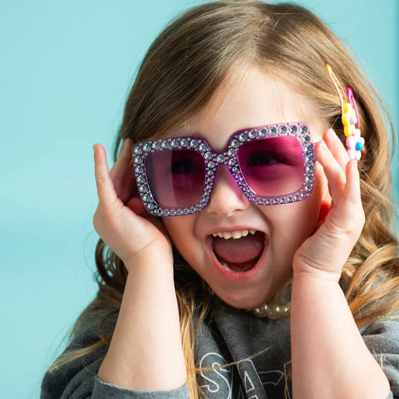 Plastic box sunglasses with black frame and gray lenses for sun protection