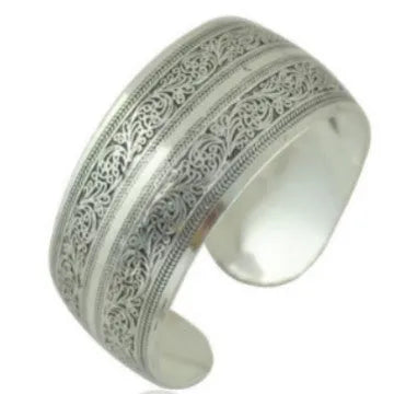 Carved open Miao silver alloy bracelet in Elephant and Turtle colour options with Roman shape