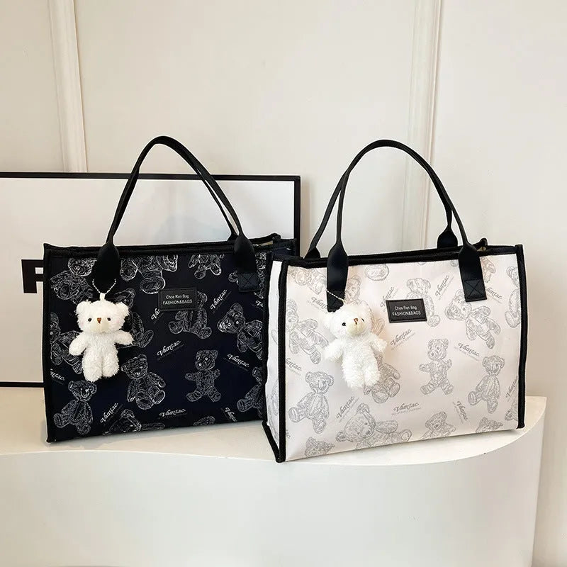 Women's large capacity canvas tote bag with rhombus pattern and sandwich pocket in black or white