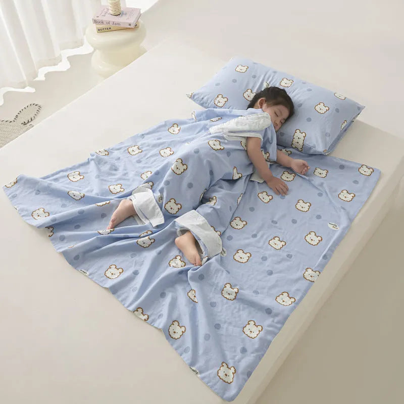 Light blue anti-kick summer blanket with antibacterial filler on a bed