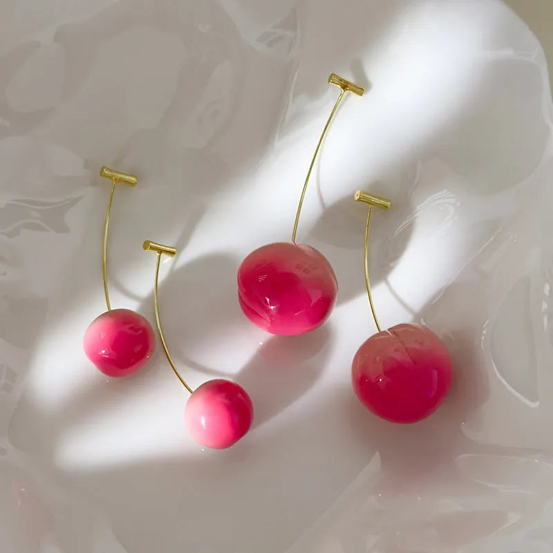 Small and large peach fruit earrings made from acrylic with copper earring findings