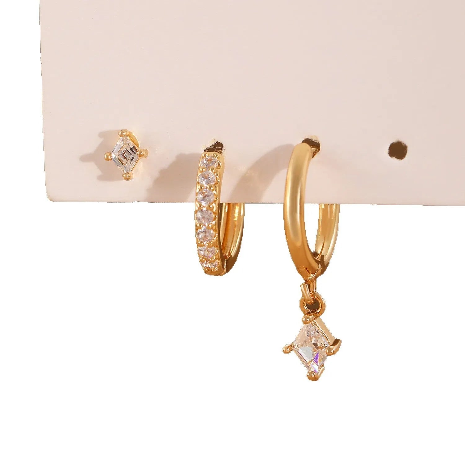 Ladies three-piece earring set with geometric designs and inlaid zircon accents