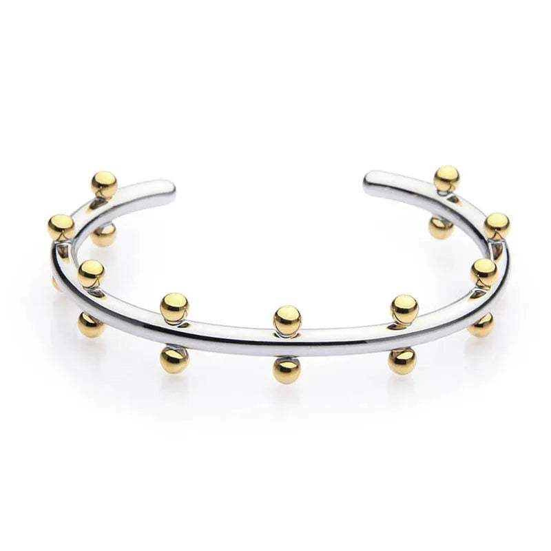 Adjustable C-shaped bracelet with round stainless steel bean beads on an alloy chain.