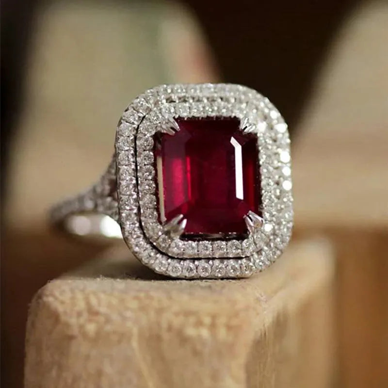 Copper square princess ring with rhinestone centre in F827 red colour, showing geometric design details