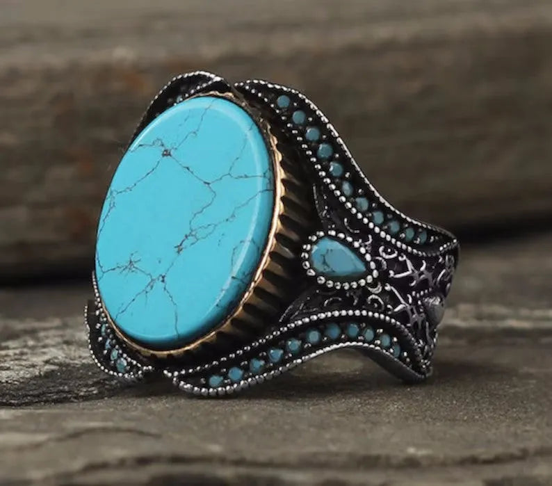 Men's round alloy ring with antique silver finish and turquoise decorative element