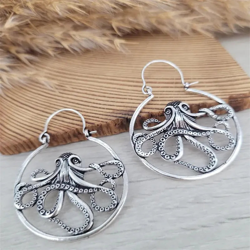 Vintage octopus earrings in antique silver finish with detailed animal zodiac design