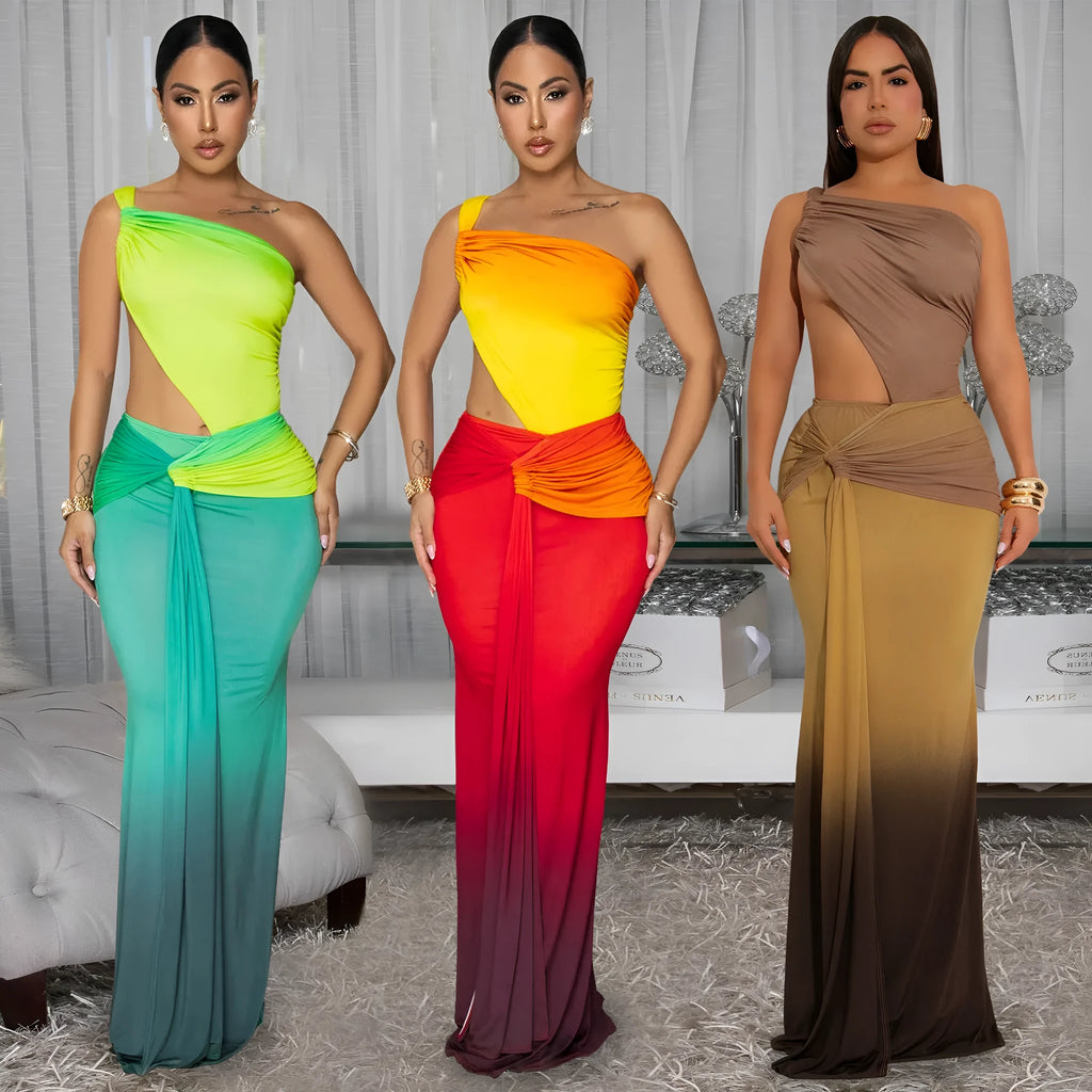 A woman's gradient colour cross-shoulder sleeveless dress with a high waist and long skirt.