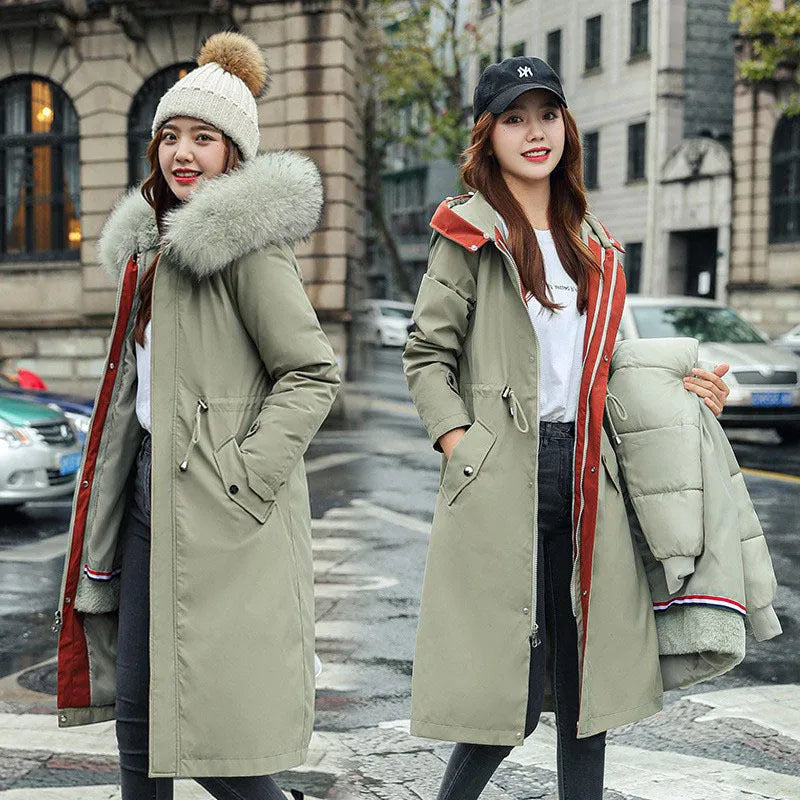 Women's long beige trench coat with a two-way zip front and fleece lining.